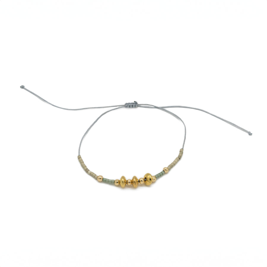 Pulsera de hilo con dorado y miyuki
