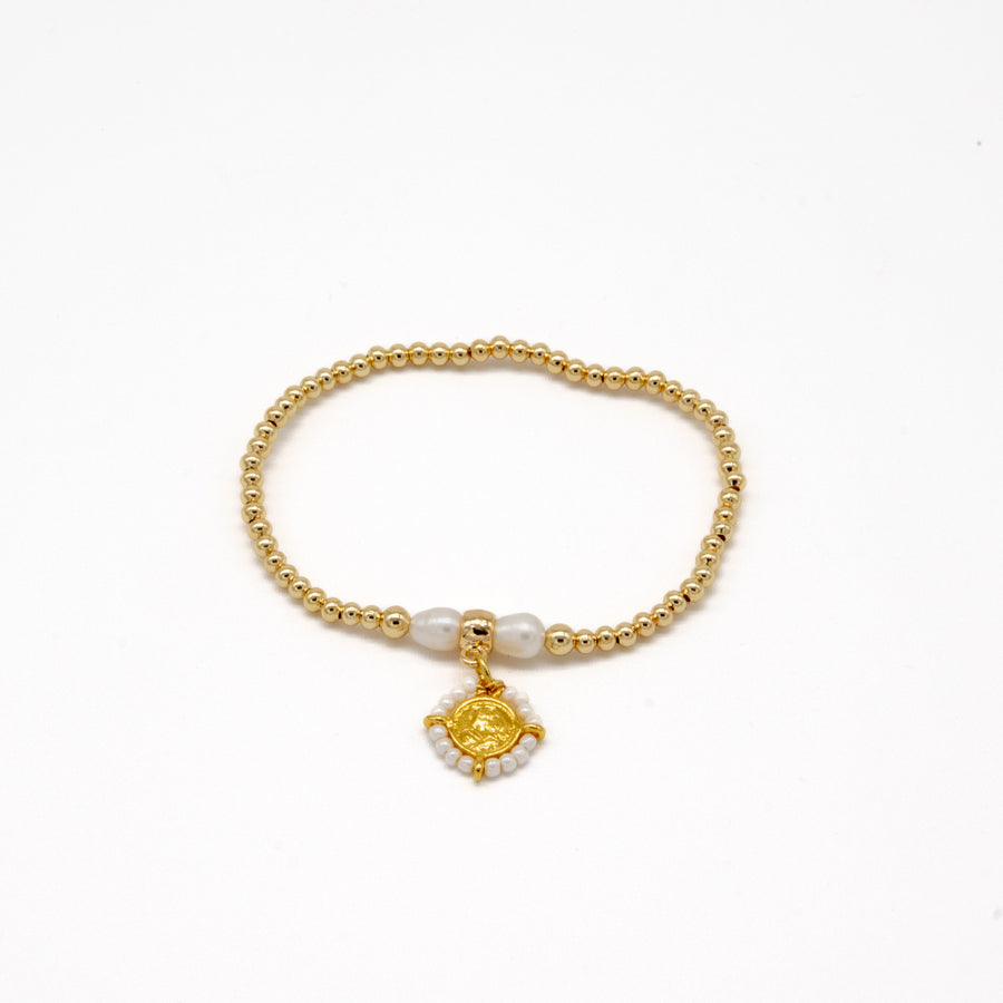 Pulsera elástica con escapulario bordado