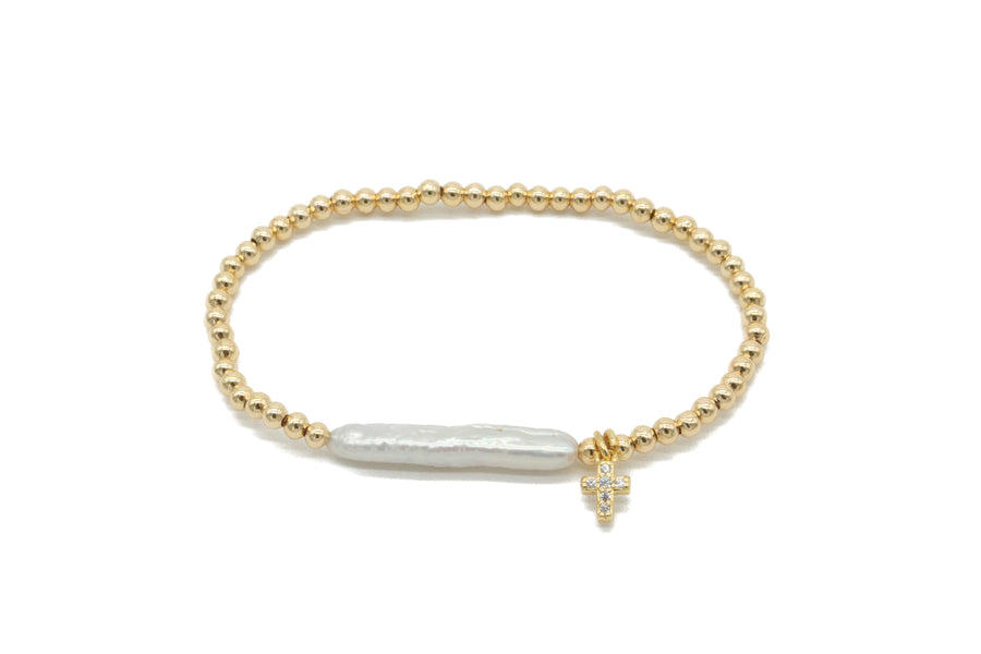 Pulsera de perla alargada y cruz mini