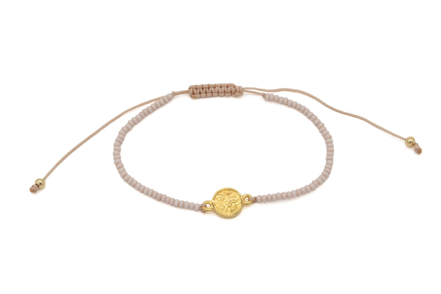 Pulsera de chaquira con medalla de escapulario