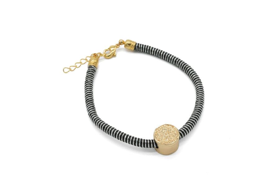 Pulsera San Benito tambor cordón metálico
